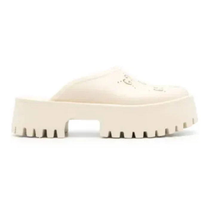 Gucci Perforated GG platform mules
